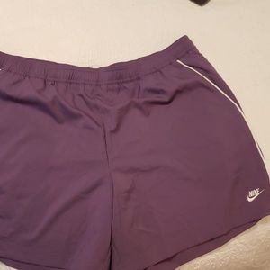 Women's Nike Dri-Fit running shorts. XL. Purple & white. 2 slit pockets on sides